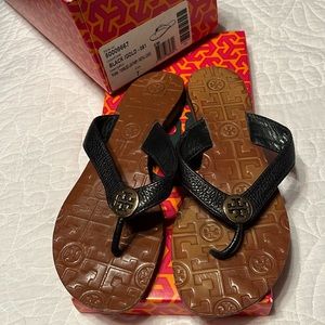 Tory Burch. Size 7  Thora tumbled leather black sandals